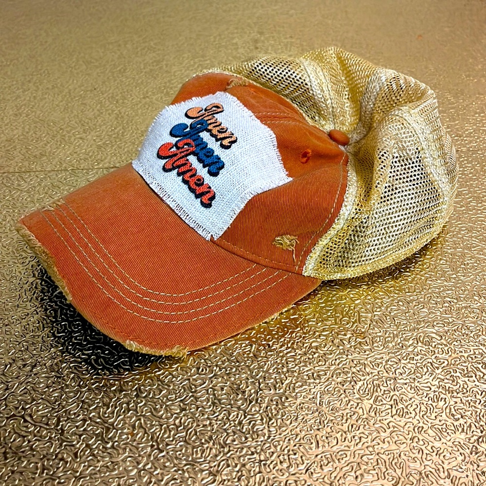Amen on burnt orange hat